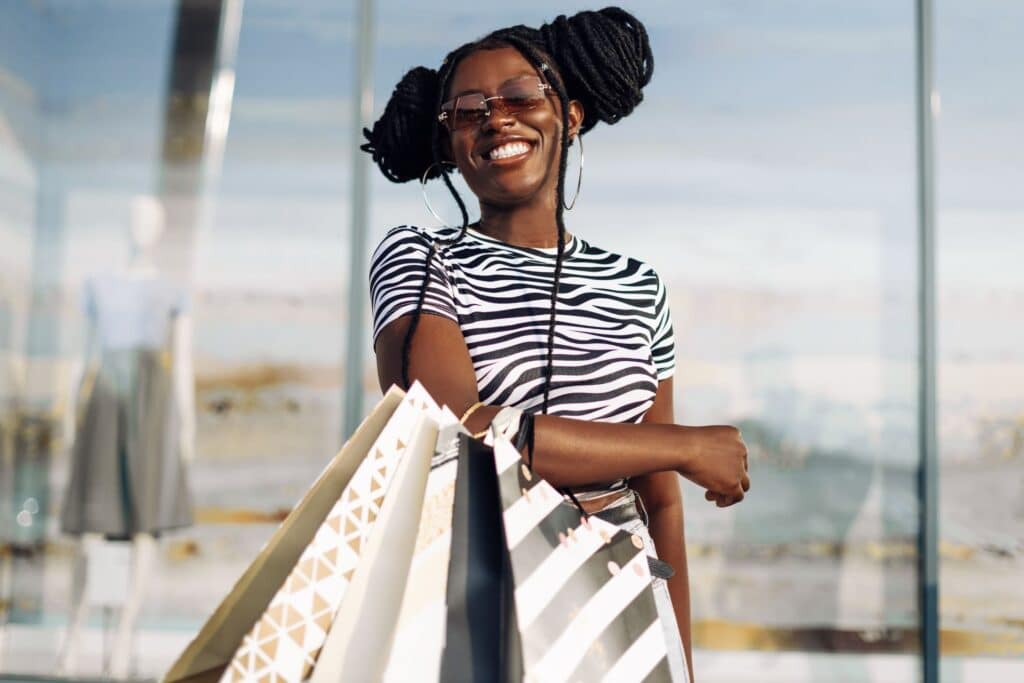 woman shopping in Ostend and smiling at the camera